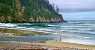 Surfer at Short Sands Beach Oregon